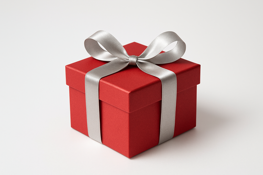 Confezione regalo rossa con nastro argentato